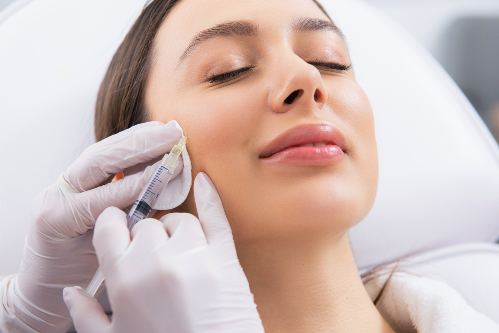 Person in bed unable to sleep due to restless leg syndrome in Walnut Creek, CA Woman getting Botox in Walnut Creek, CA